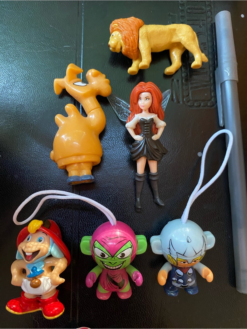 Assorted small toys, action figures, animals